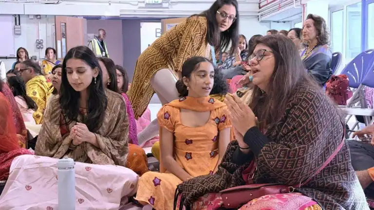 Volunteers and pupils singing at the Gayatri Yagna